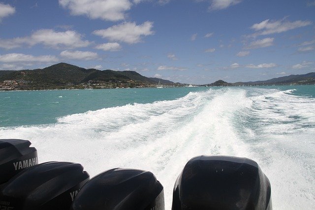 engines of a power boat at full throttle BoaTzNow